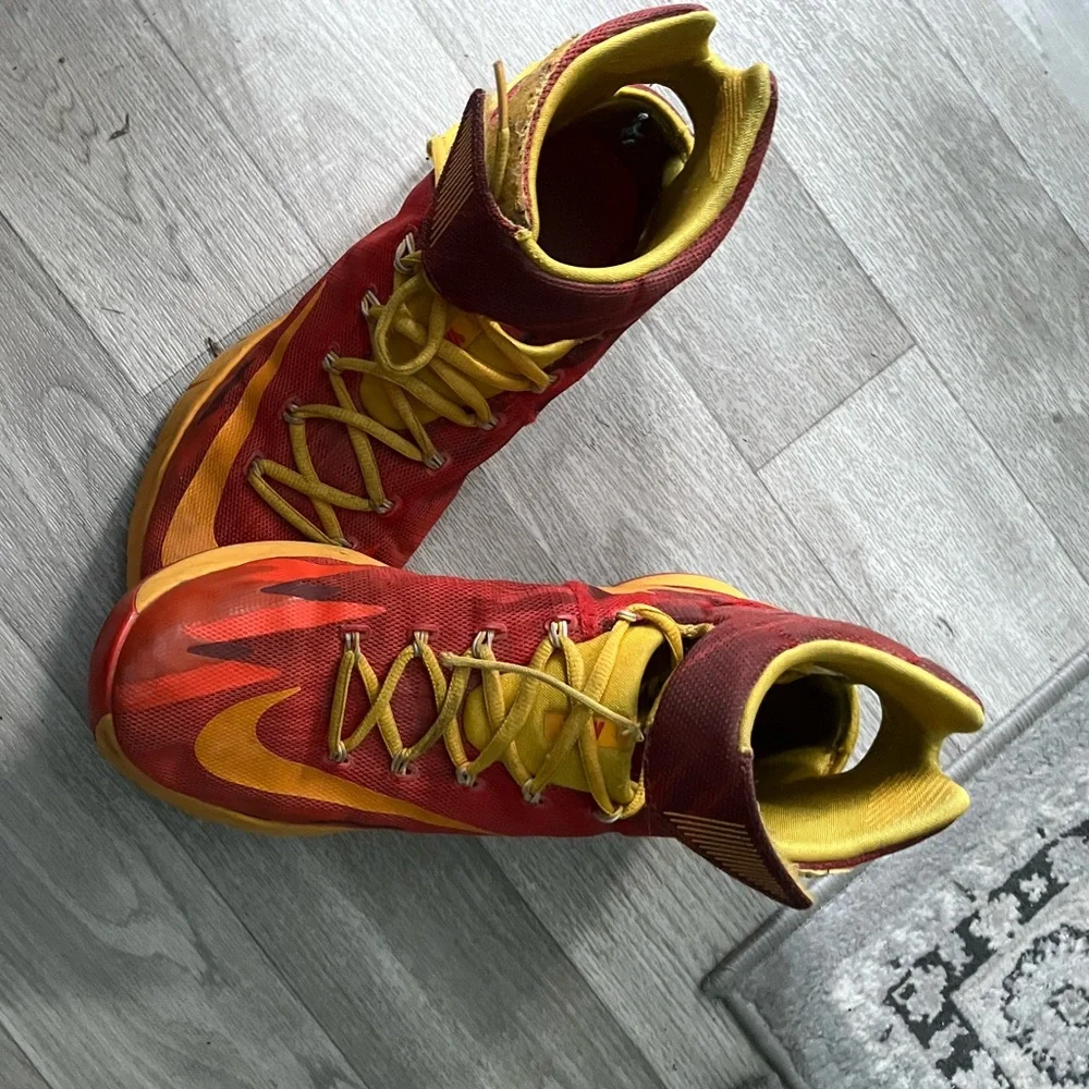 Red‎ and Yellow Nike Zoom High-Top Sneakers.